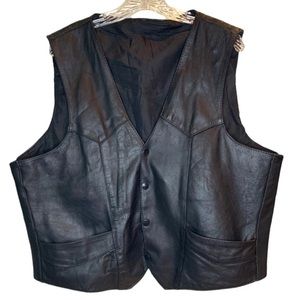 Vintage black leather vest. Light weight lining. Inner and outer …
